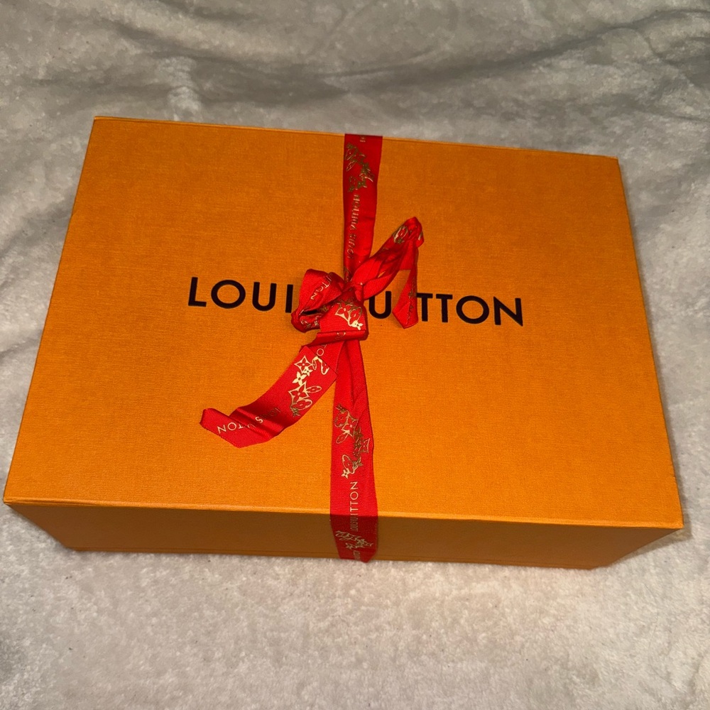 Louis Vuitton Bright Orange Box with Bold Red Ribbon